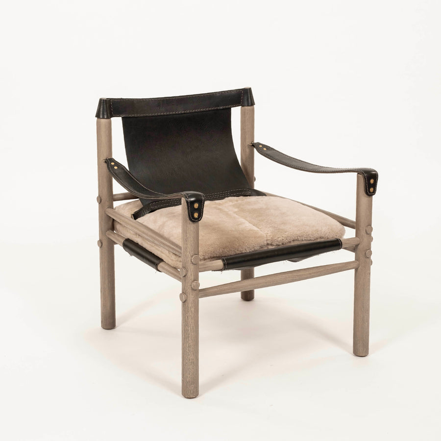 Pair Black Leather Shearling Sling Chairs