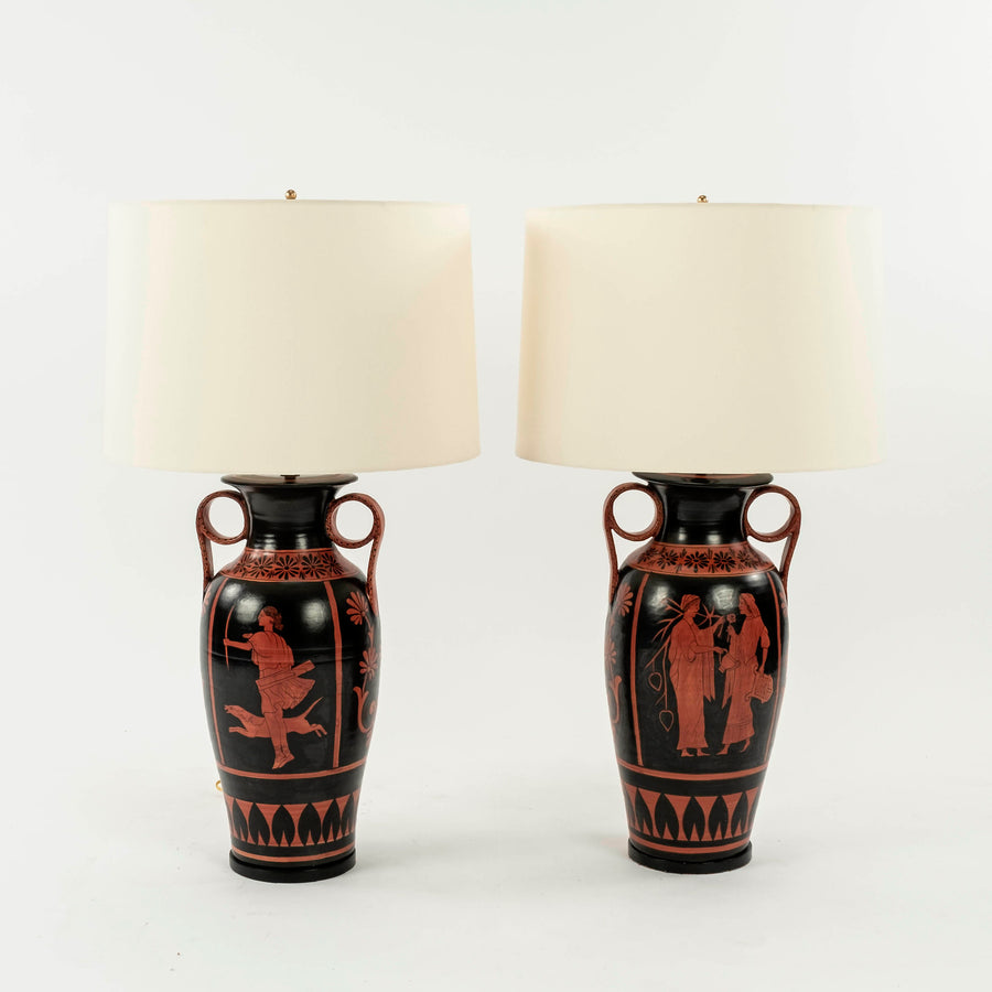 Two urn table lamps featuring classic red-on-black Etruscan-style artwork on the urn base.